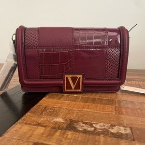 Burgundy cross body faux leather bag
